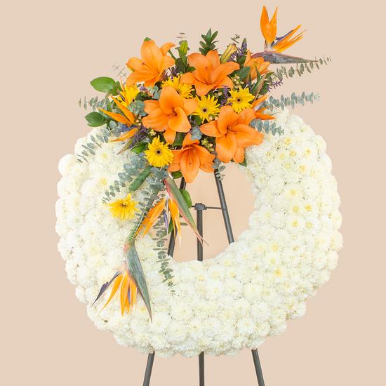 CORONA ATARDECER CON LIRIOS Y GERBERAS NARANJAS